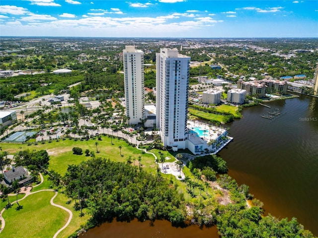 bird's eye view featuring a water view and a city view