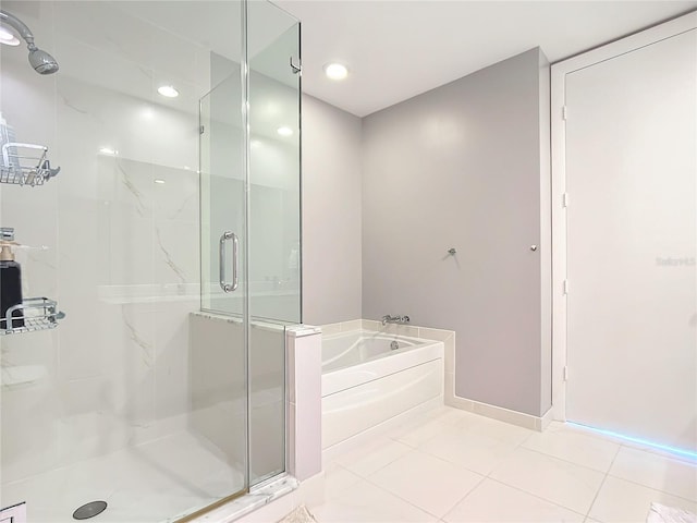 full bath with a stall shower, baseboards, tile patterned floors, a bath, and recessed lighting