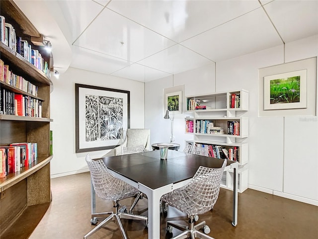 home office with finished concrete floors