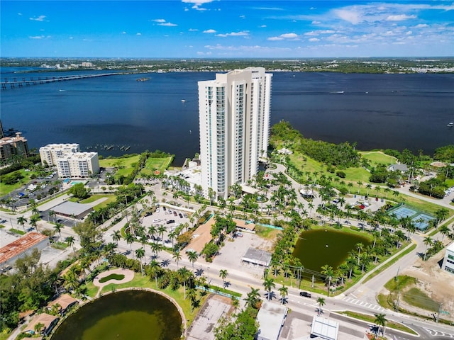 bird's eye view featuring a water view and a city view