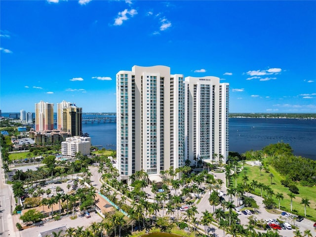 aerial view featuring a view of city and a water view