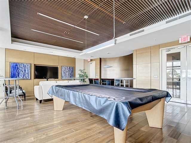 game room featuring wood ceiling, billiards, a raised ceiling, and wood finished floors