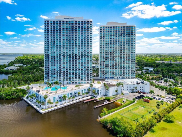 bird's eye view featuring a water view and a city view