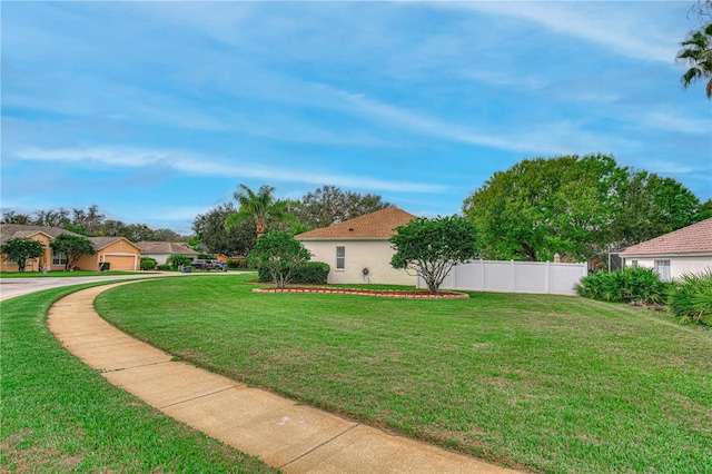 view of yard with fence