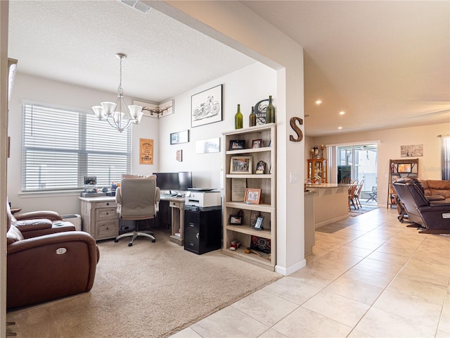 office with light carpet, a textured ceiling, an inviting chandelier, and light tile patterned floors