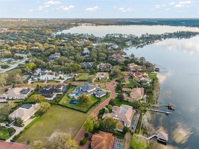 aerial view featuring a water view and a residential view