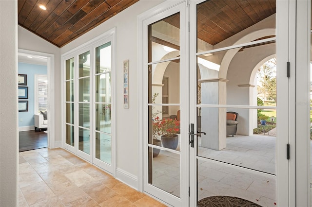 doorway featuring wooden ceiling, recessed lighting, baseboards, vaulted ceiling, and french doors