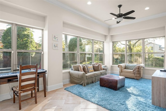 sunroom with ceiling fan