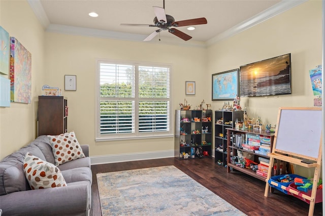 living area with recessed lighting, crown molding, baseboards, and wood finished floors