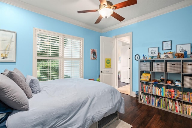 bedroom featuring ceiling fan, hardwood / wood-style flooring, and crown molding