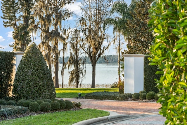 view of home's community featuring a water view