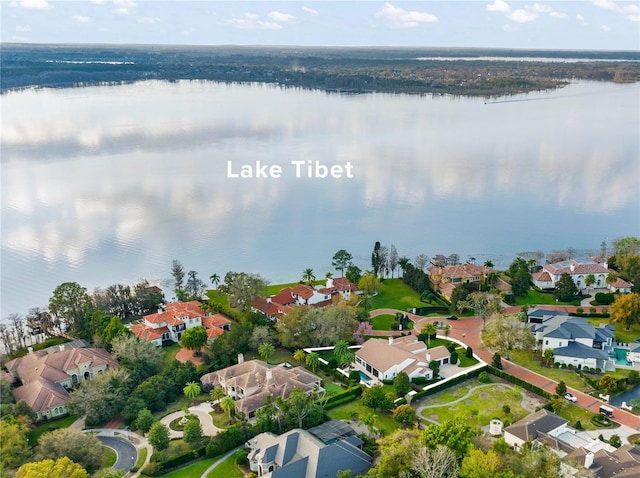 birds eye view of property featuring a residential view and a water view