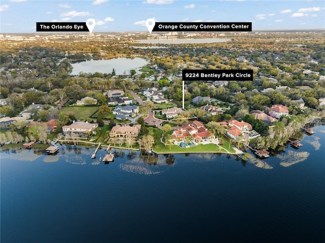 birds eye view of property featuring a water view