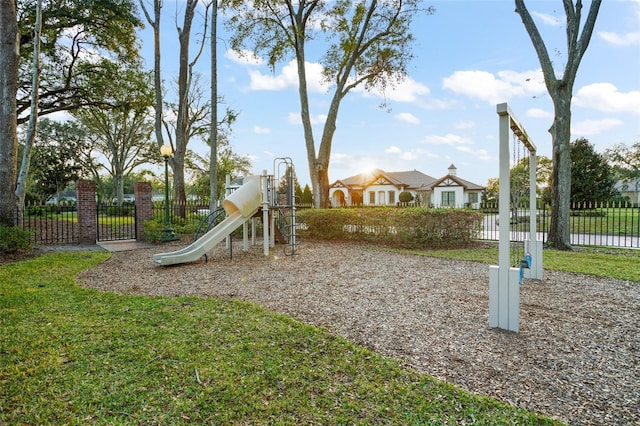 view of jungle gym with fence