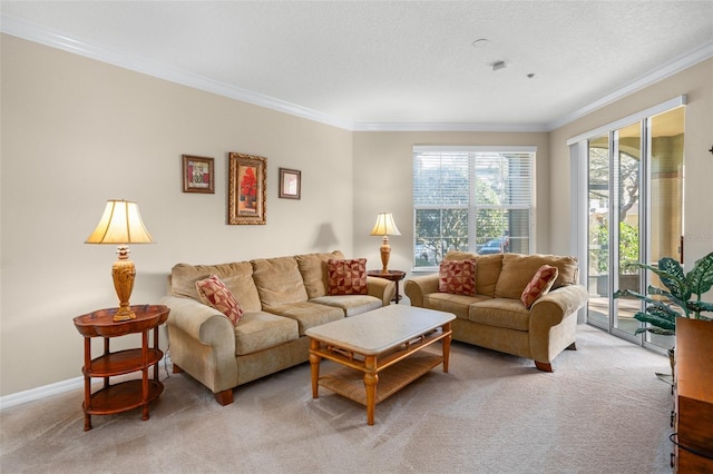 living room featuring light carpet, a textured ceiling, baseboards, and crown molding