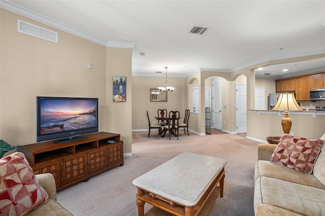 living room featuring visible vents, arched walkways, and light colored carpet