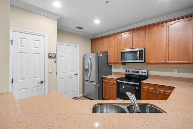 kitchen featuring stainless steel appliances, a sink, visible vents, light stone countertops, and crown molding