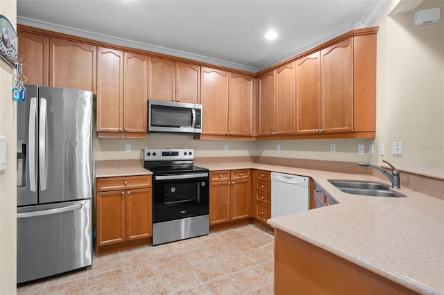 kitchen with light tile patterned floors, recessed lighting, a sink, appliances with stainless steel finishes, and brown cabinets