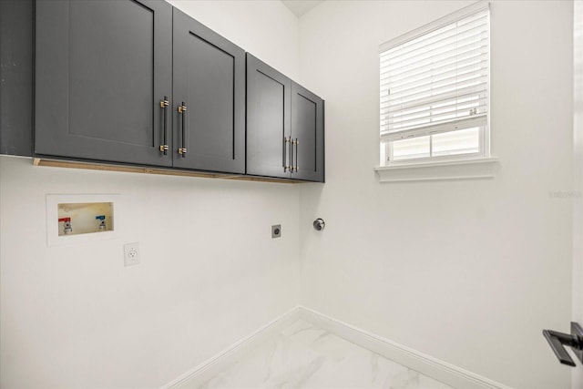 washroom featuring cabinet space, baseboards, hookup for a washing machine, marble finish floor, and electric dryer hookup