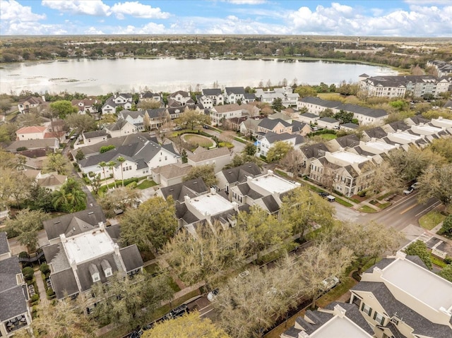 bird's eye view with a water view and a residential view