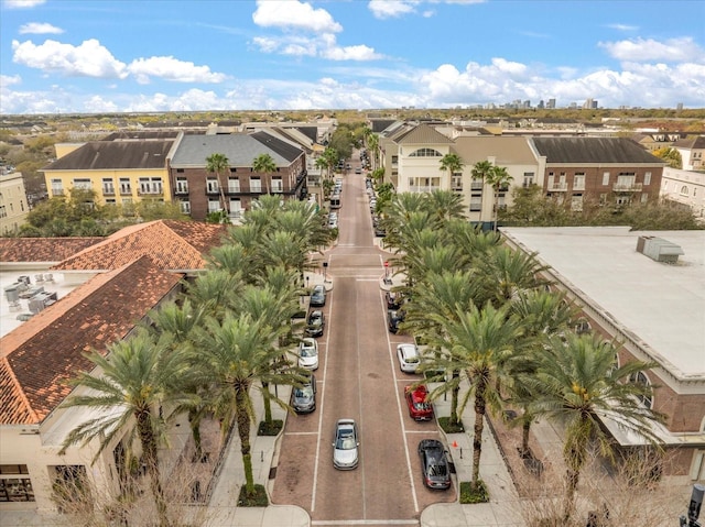 birds eye view of property with a residential view