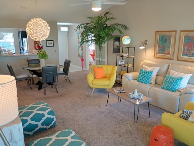 living area featuring carpet flooring