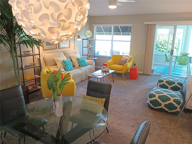 interior space featuring plenty of natural light, carpet flooring, and baseboards