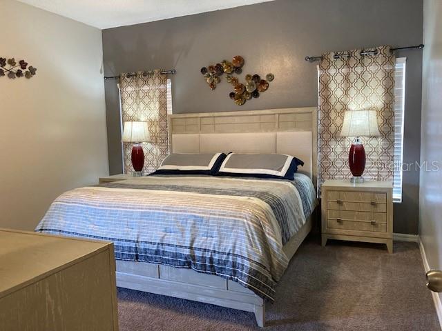 954 Lockbreeze Dr, Davenport, FL 33897 - bedroom featuring carpet