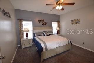 954 Lockbreeze Dr, Davenport, FL 33897 - bedroom featuring baseboards and ceiling fan