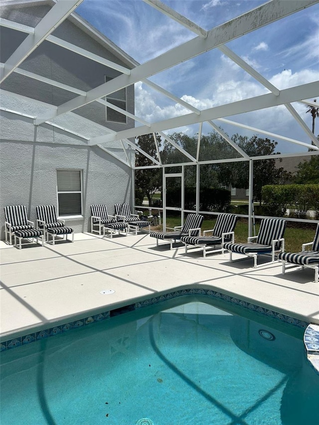 954 Lockbreeze Dr, Davenport, FL 33897 - outdoor pool featuring a patio area and a lanai