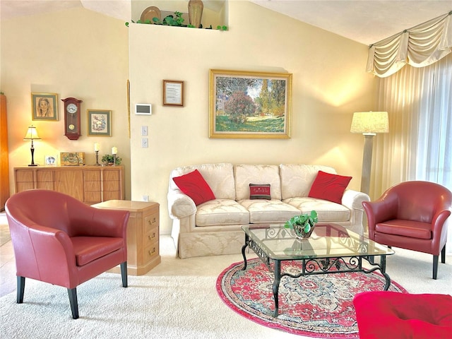 carpeted living room featuring vaulted ceiling