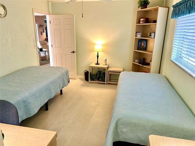 bedroom featuring light wood-type flooring
