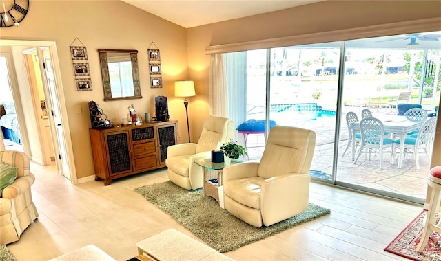 living area with wood finished floors and plenty of natural light