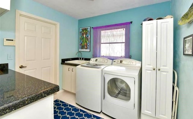 laundry room featuring separate washer and dryer