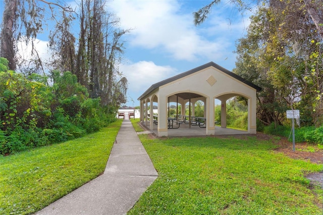 view of community featuring a gazebo and a yard