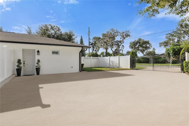 view of patio featuring fence