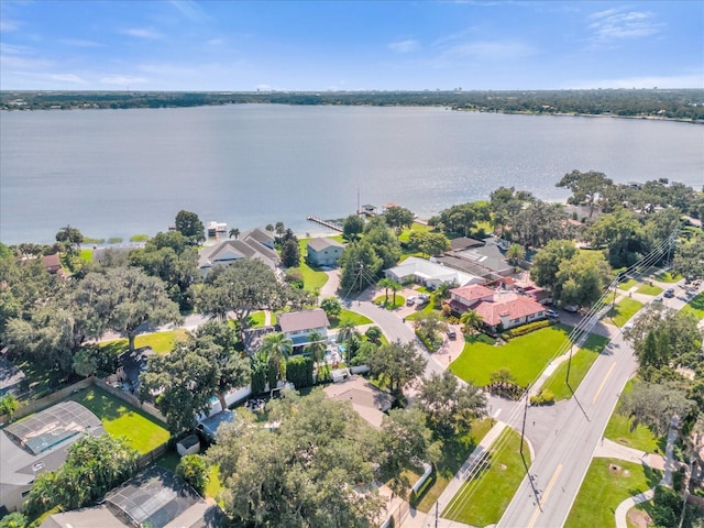 bird's eye view featuring a residential view and a water view