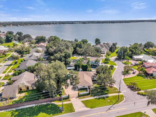 aerial view with a residential view and a water view