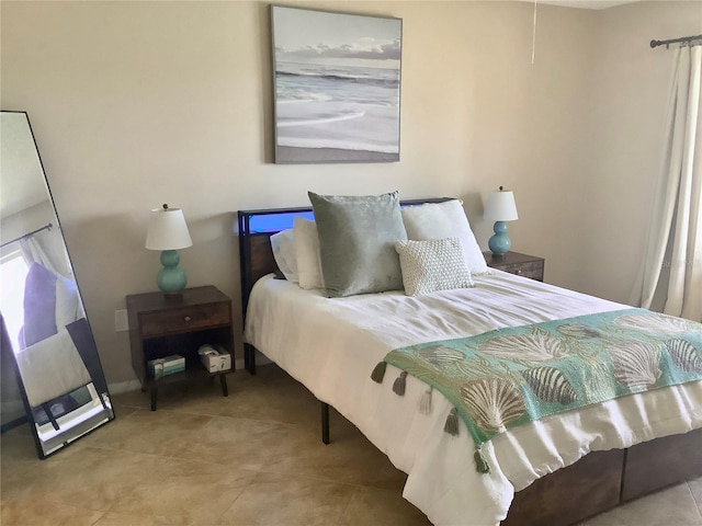 3672 Lake Bayshore Dr Unit K327, Bradenton, FL 34205 - bedroom featuring tile patterned flooring