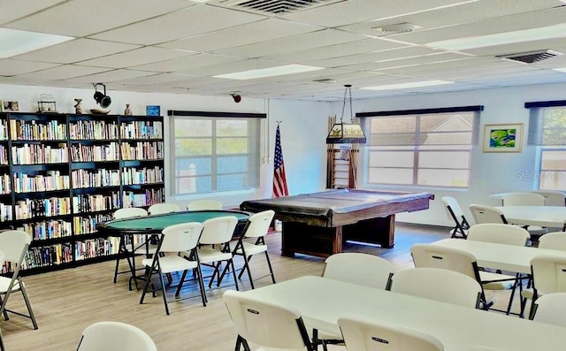 3672 Lake Bayshore Dr Unit K327, Bradenton, FL 34205 - recreation room with a paneled ceiling, visible vents, and light wood-style floors
