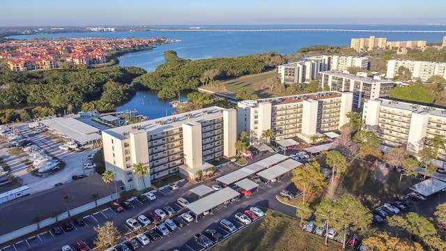 aerial view with a city view and a water view