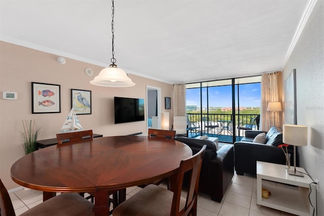 dining area featuring crown molding, floor to ceiling windows, and light tile patterned floors