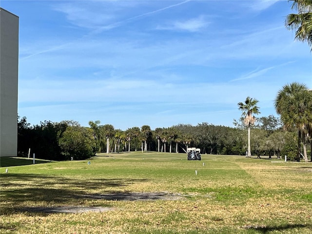 surrounding community featuring a lawn