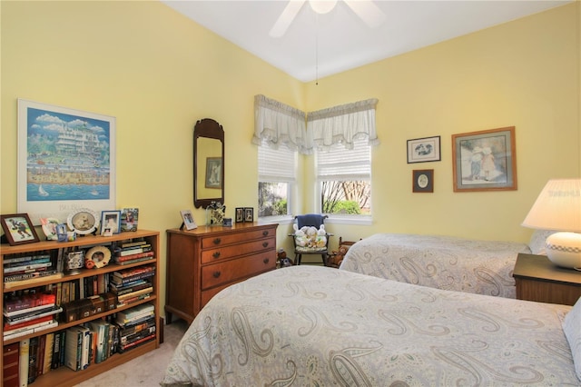 carpeted bedroom featuring a ceiling fan