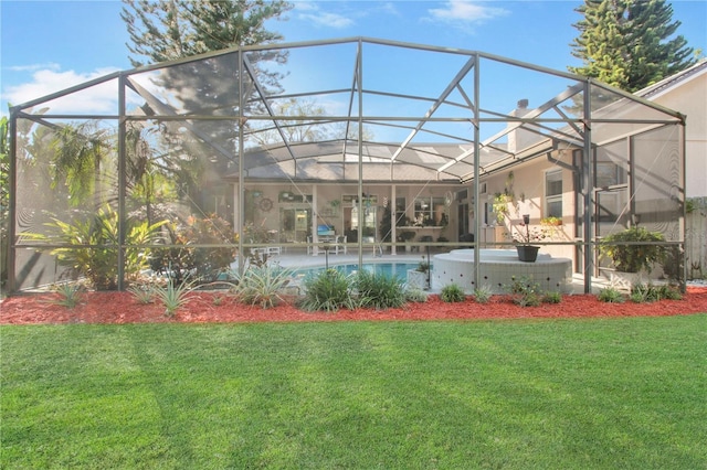 back of property featuring an outdoor pool, glass enclosure, a lawn, and a patio