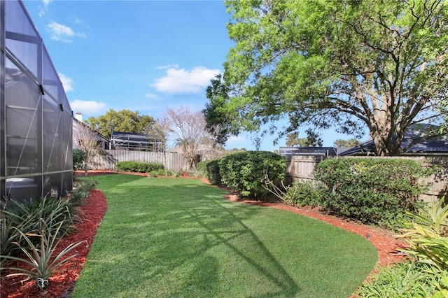 view of yard featuring a fenced backyard