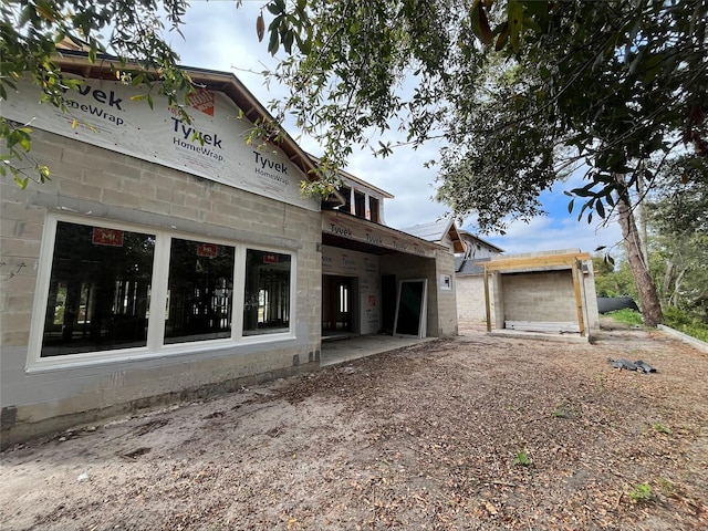 exterior space with an outbuilding