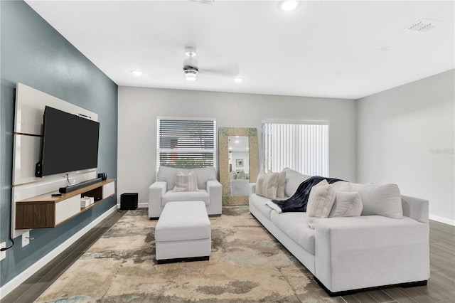 living room with recessed lighting, visible vents, ceiling fan, wood finished floors, and baseboards