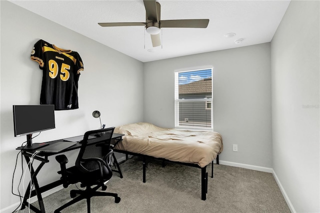 bedroom with carpet flooring, ceiling fan, and baseboards