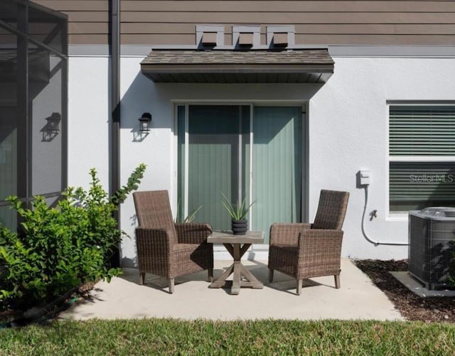 view of patio with central AC